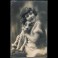 Stara francuska pocztówka zdjęciowa nr DIX 2602 - nadana 15 V 1929 kobieta w stylu lat 20-30 z psem